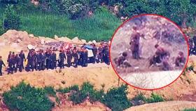 [영상] '지뢰 묻고 대전차 방벽 설치?' DMZ 내 대규모 북한군 작업 모습 포착…수십 명 군사분계선 또 내려온 이유