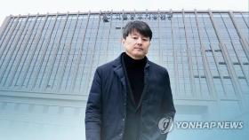 '뇌물수수' 유재수 1심 집유…