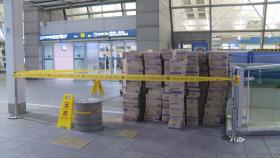 경찰, 인천공항서 '마스크 1만개 박스갈이' 홍콩인 조사