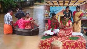 홍수에 대형 솥 타고 결혼식간 인도 커플