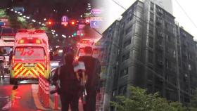 화마에 검게 그을린 아파트…중상자 중 1명 사망